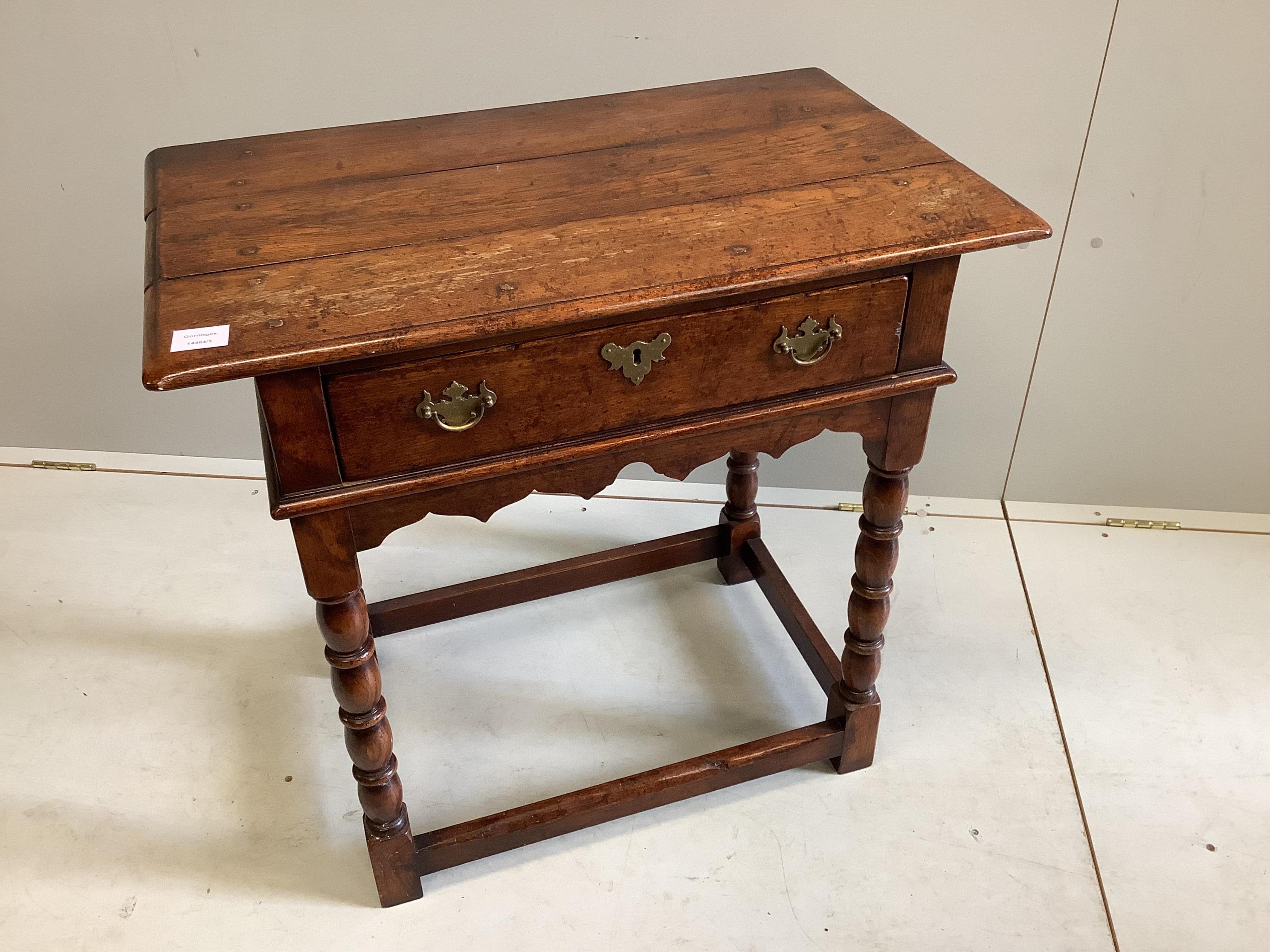 An 18th century style rectangular oak side table, width 75cm, depth 45cm, height 73cm. Condition - fair